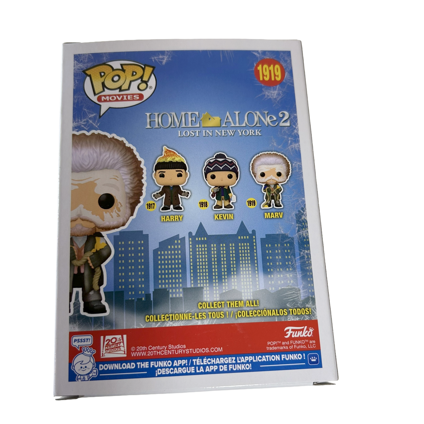 Funko Pop! packaging for Home Alone 2 with character illustrations on a blue and white background