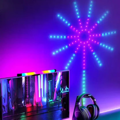 Colorful LED light projector on a dark background with gaming setup