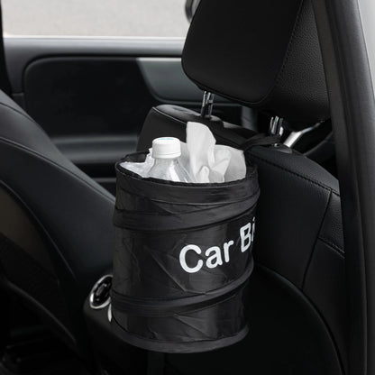 Black car bin with 'Car Bin' text attached to a car's headrest.